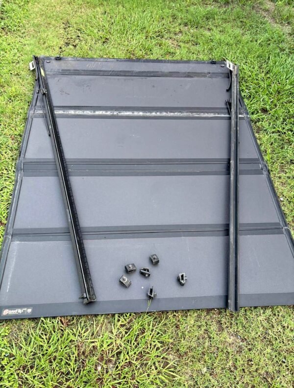 photo_2026-09-14_20-02-31 2019-2025 Chevy Silverado GMC Sierra 1500 6'7" Hard Folding Tonneau Bed Cover