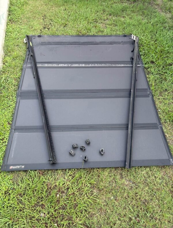 photo_2026-09-14_20-02-44 2019-2025 Chevy Silverado GMC Sierra 1500 6'7" Hard Folding Tonneau Bed Cover