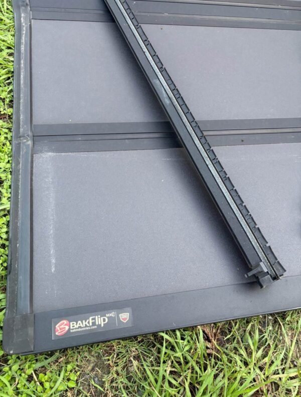 photo_2026-09-14_20-02-50 2019-2025 Chevy Silverado GMC Sierra 1500 6'7" Hard Folding Tonneau Bed Cover